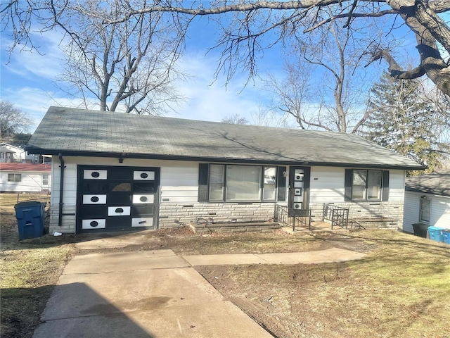 single story home featuring a garage