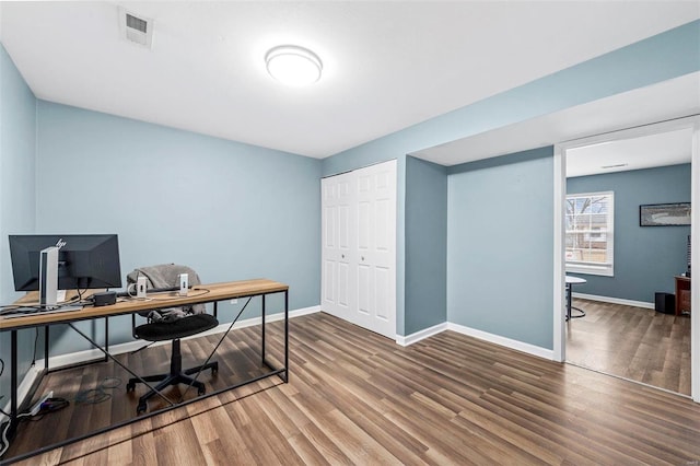 home office featuring hardwood / wood-style floors