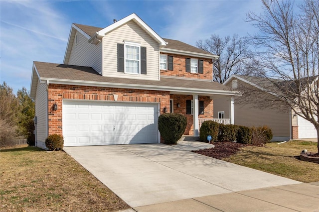 view of front of home featuring a porch, a garage, and a front yard