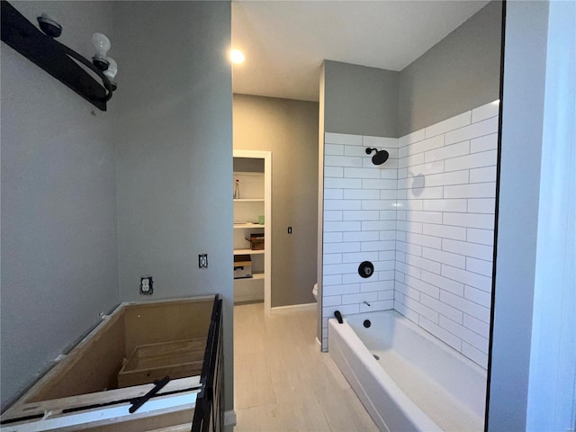 full bath featuring vanity, shower / bathing tub combination, toilet, and wood finished floors