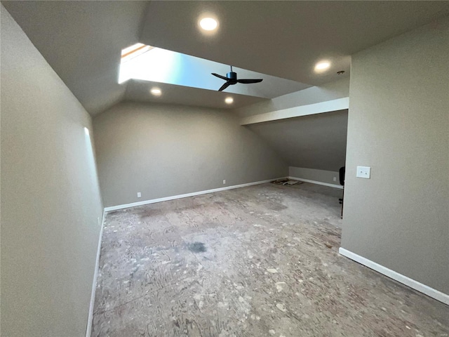 additional living space with lofted ceiling, recessed lighting, a ceiling fan, and baseboards