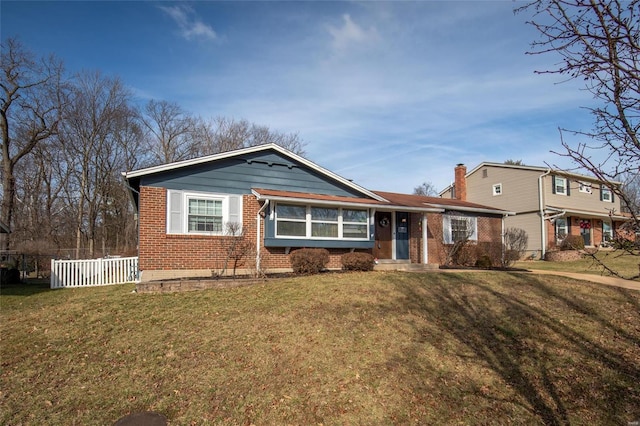 view of front of property with a front lawn