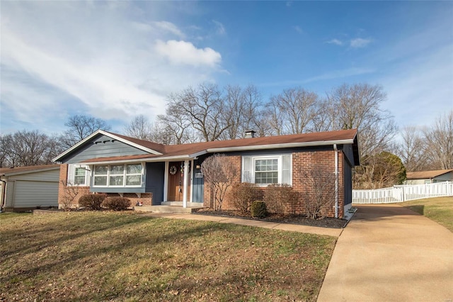 ranch-style house with a front lawn