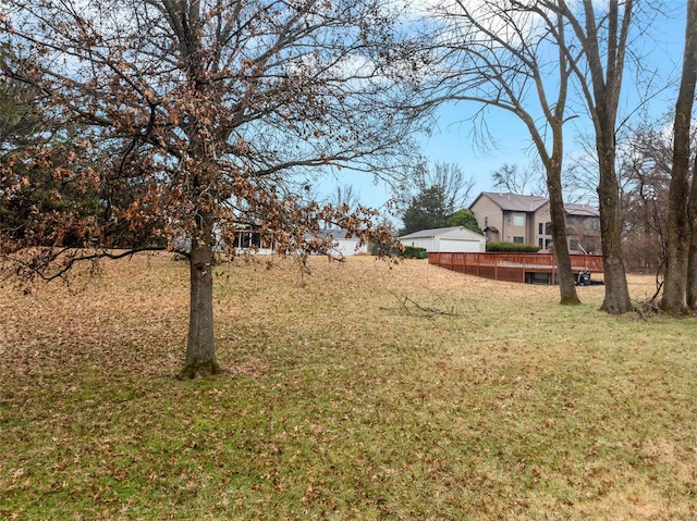 view of yard featuring a wooden deck