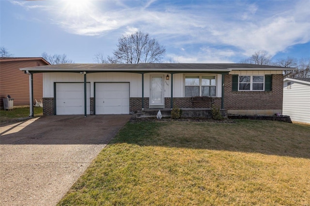 single story home featuring a garage and a front lawn