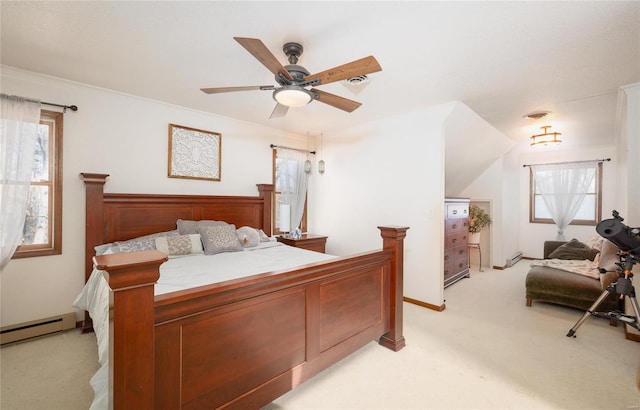 bedroom with crown molding, light colored carpet, ceiling fan, and a baseboard heating unit