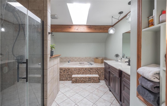 bathroom with a skylight, vanity, tile patterned floors, shower with separate bathtub, and beamed ceiling