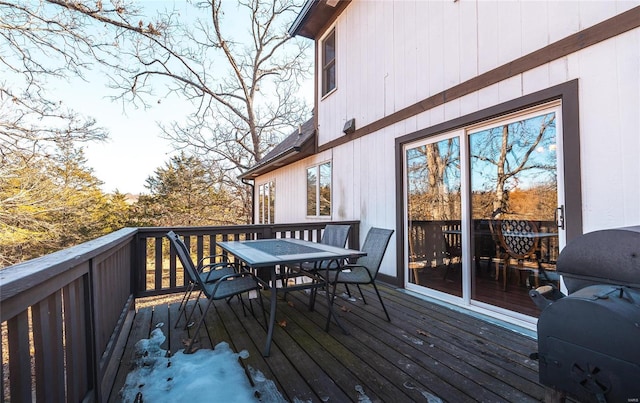 wooden deck with grilling area