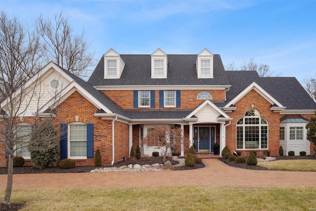 view of front of home with a front lawn