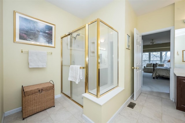 full bath featuring ensuite bathroom, a stall shower, visible vents, and baseboards