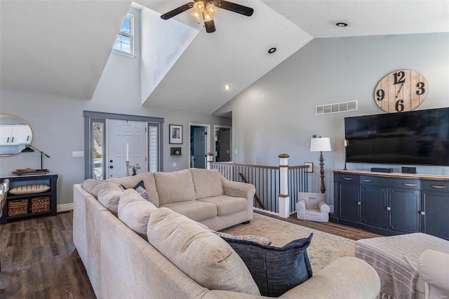 living room with ceiling fan, high vaulted ceiling, and dark hardwood / wood-style flooring