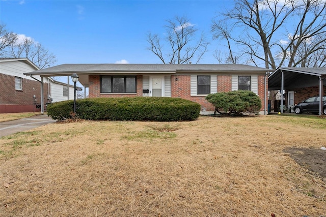 single story home featuring a carport and a front lawn