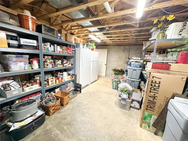 storage area with washer / clothes dryer