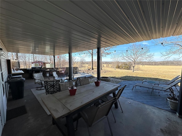 view of patio / terrace with a rural view