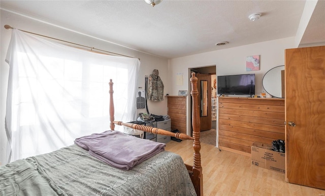 bedroom featuring light hardwood / wood-style flooring