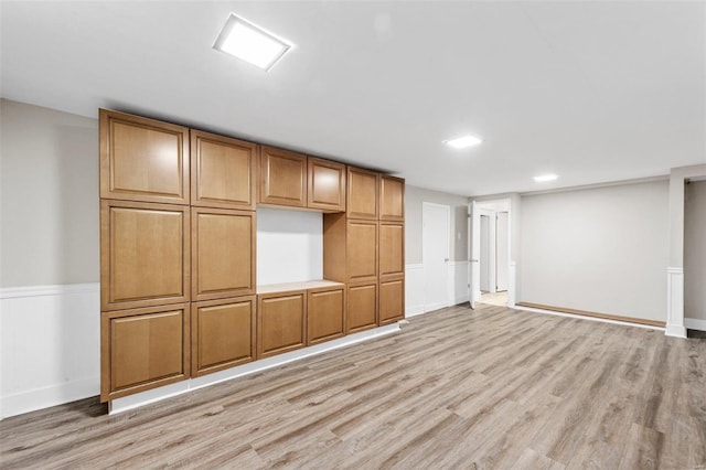 unfurnished living room featuring light hardwood / wood-style flooring