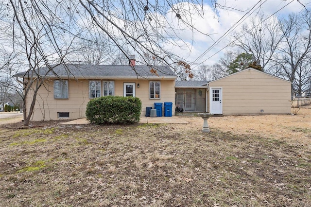 rear view of house featuring a patio area