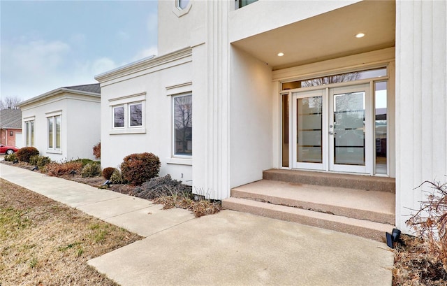 property entrance featuring french doors