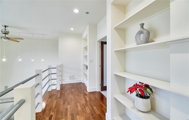 hallway with dark wood-type flooring