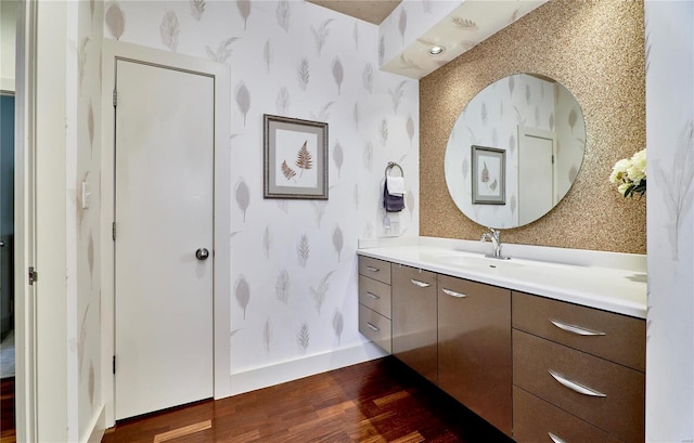 bathroom featuring vanity and wood-type flooring