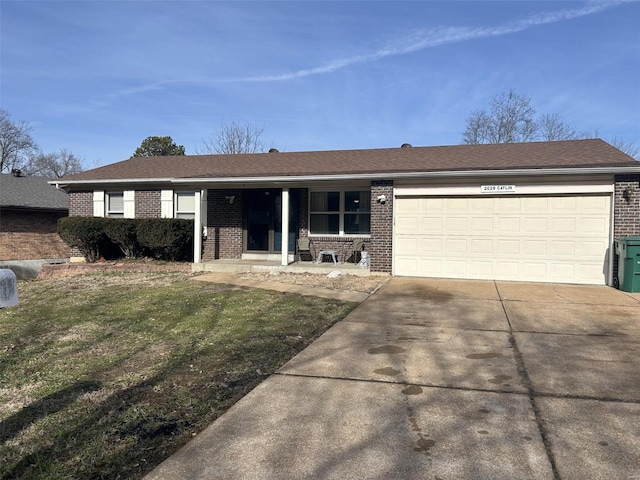 single story home with a garage, covered porch, and a front lawn