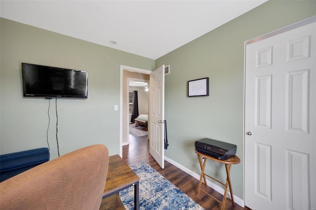 interior space with dark hardwood / wood-style flooring