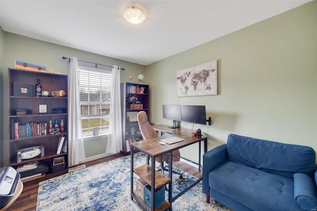 office with hardwood / wood-style flooring