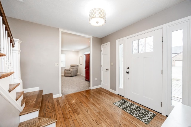 entrance foyer with light wood-type flooring