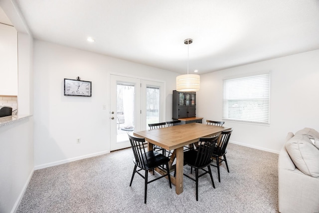 view of carpeted dining room