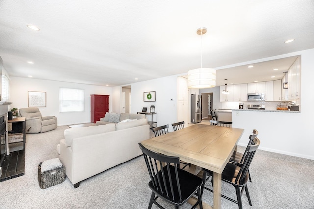 view of carpeted dining room