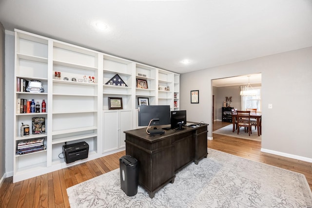 office area with light hardwood / wood-style flooring