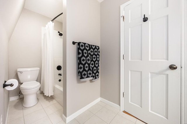 bathroom with shower / bath combo, tile patterned floors, and toilet