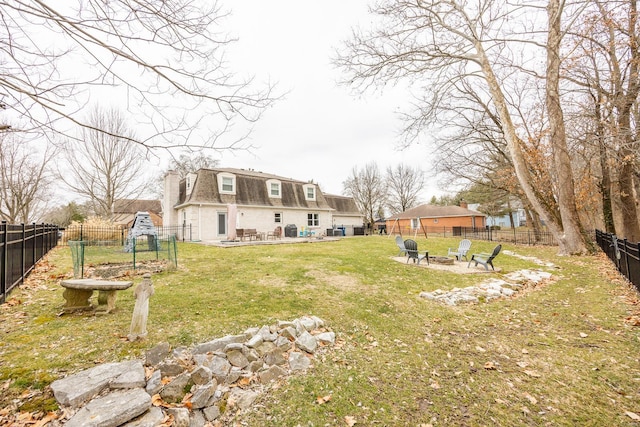 view of yard with an outdoor fire pit and a patio area