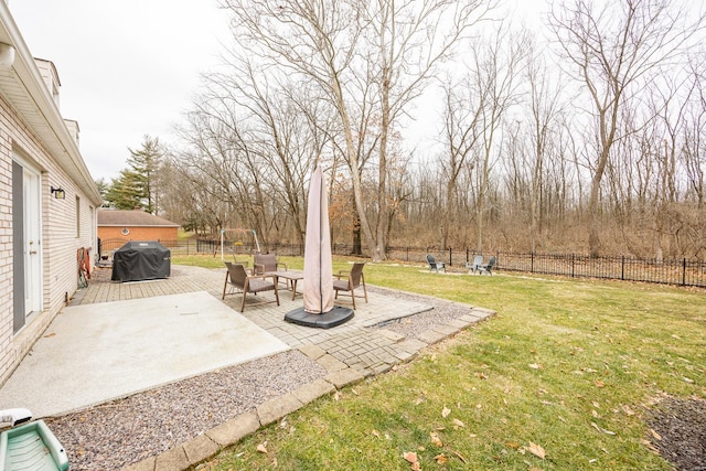 view of yard with an outdoor fire pit and a patio