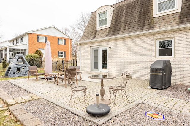 back of house featuring a patio