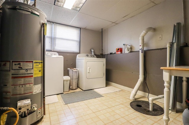 laundry room with independent washer and dryer and gas water heater