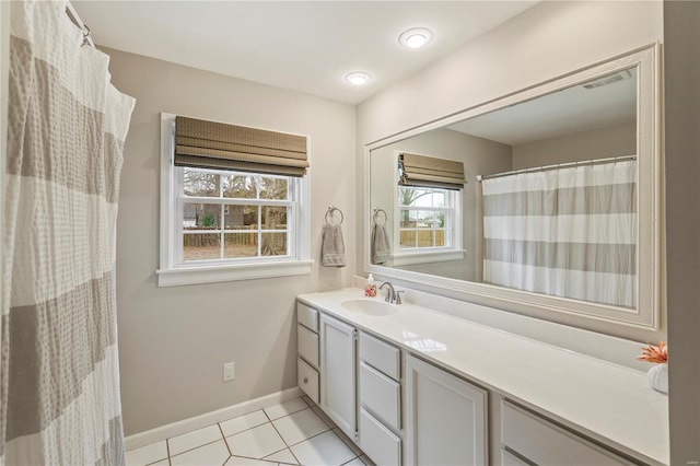 bathroom with vanity and tile patterned flooring