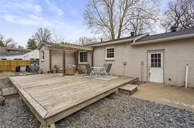 wooden terrace featuring an outdoor hangout area and a pergola