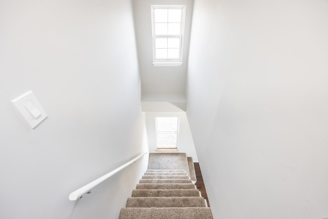 stairway featuring a healthy amount of sunlight