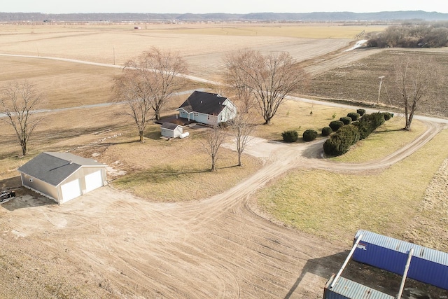 birds eye view of property featuring a rural view