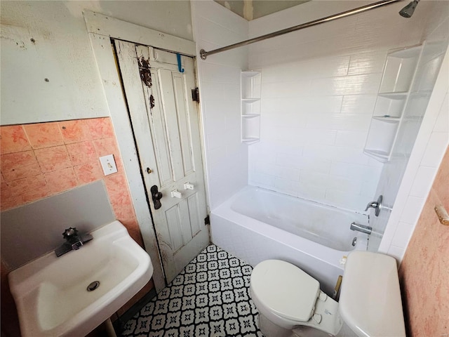 full bathroom with shower / washtub combination, toilet, and sink