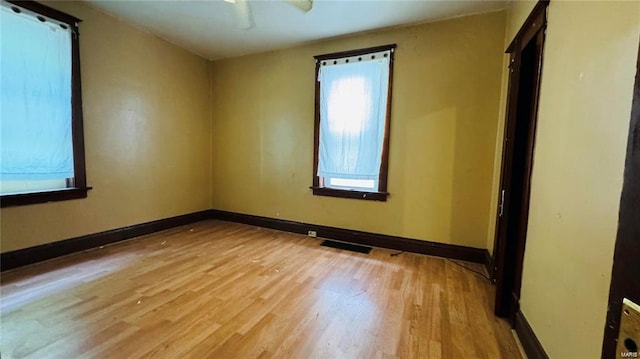 empty room with light wood-type flooring