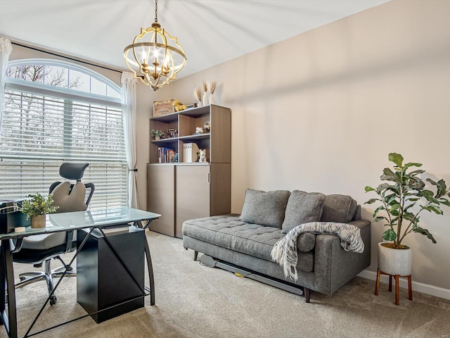 carpeted office space featuring a notable chandelier