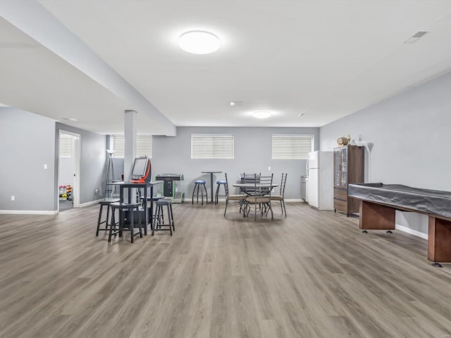 dining space featuring hardwood / wood-style floors