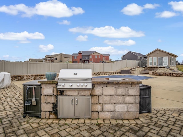 view of patio / terrace featuring area for grilling and grilling area