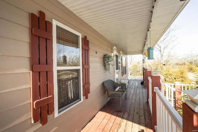 deck with covered porch