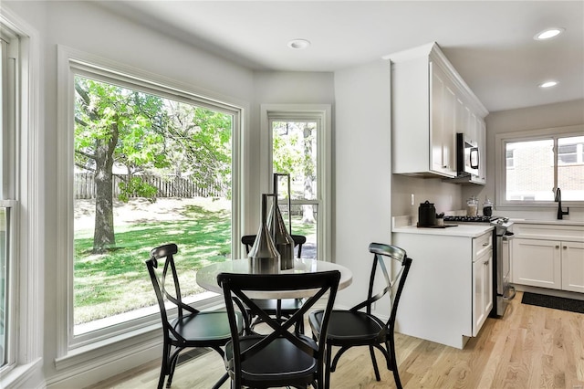 dining area featuring light hardwood / wood-style flooring