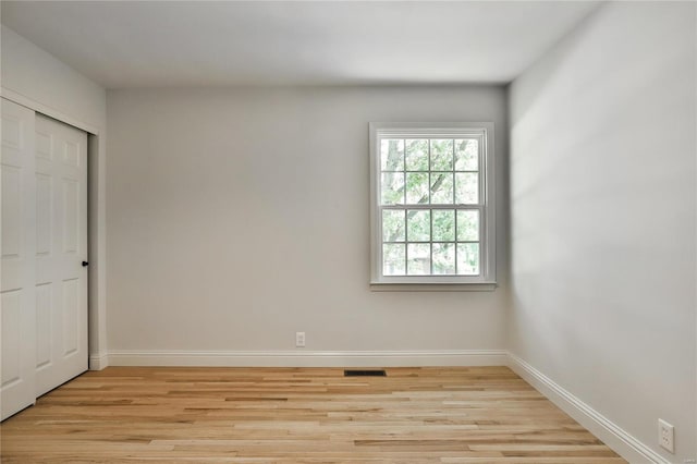 empty room featuring light hardwood / wood-style flooring