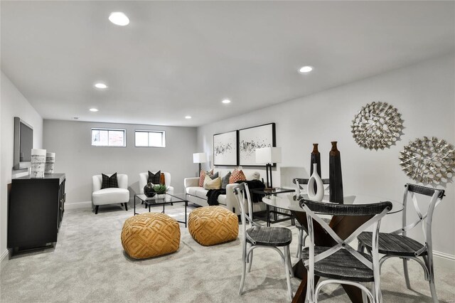 living room featuring light carpet