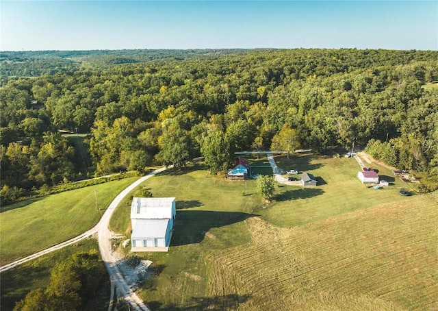 birds eye view of property with a rural view